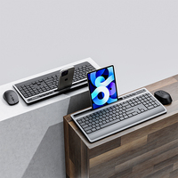 104 teclas alemán España Rusia Japón coreano EE. UU. Diseño Bluetooth recargable inalámbrico teclado y ratón combinado con soporte para teléfono