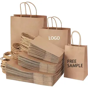 Eco friendly reciclable logotipo personalizado negro blanco impresión al por mayor llevar compras marrón artesanía bolsa de papel Kraft con asas