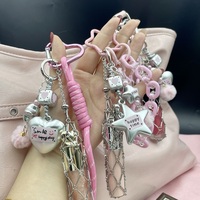Porte-clés tendance et élégant en acier inoxydable avec pendentif cœur pentagramme et chaîne rose, sac en filet pour rouge à lèvres, vente en gros