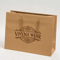 Sac cadeau en papier brun écologique recyclé avec design personnalisé en feuille d'or de luxe