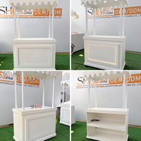 Chariot mobile pliable moderne et portable pour mariage, fleurs, nourriture, fête, desserts, bonbons, café, bar, présentoir de vente au détail, couleur personnalisée, location pour événements