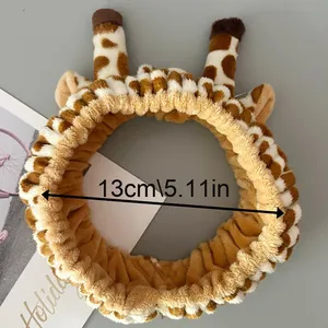 Vente en gros Bandeau en bois de <span class=keywords><strong>girafe</strong></span> bicolore pour filles Attache à cheveux en peluche douce pour une coiffure de fête mignonne - Product Image 3