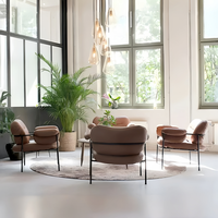 Chaises de salle à manger ergonomiques en cuir de style nordique moderne et luxueux avec dossier en tissu Teddy et design bouclé de luxe