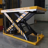 Plateforme élévatrice à ciseaux hydraulique stationnaire robuste, directement de l'usine, pour la manutention de marchandises en entrepôt