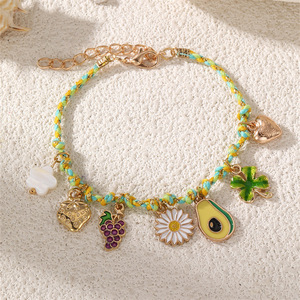 Pulsera Tejida Multicolor Hecha a Mano con Dijes de Oro de la Serie Océano: Estrella de Mar, Tortuga, Pez, Flor y Perla - Product Image 5