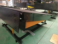 Leveur électrique robuste 6-10Ton niveleur de quai hydraulique rampe de chargement de conteneur stationnaire pliable moteur de compresseur Emerson