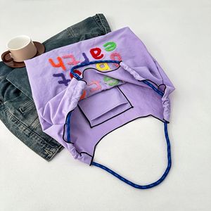 2025กระเป๋าสะพายไหล่ผ้าใบสีสันสดใสจุของได้<span class=keywords><strong>เ</strong></span>ยอะสำหรับผู้หญิงพร้อมกระ<span class=keywords><strong>เ</strong></span>ป๋าดีไซน์ตัวหนังสือรูปโลก - Product Image 4