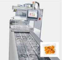 Machine d'emballage sous vide automatique pour emballages alimentaires avec film pour l'industrie alimentaire