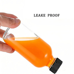 OEM ODM Bouteille en verre transparente de 2 oz pour eau, soda, lait, jus avec bouchon <span class=keywords><strong>à</strong></span> vis en plastique, bouteilles rondes de <span class=keywords><strong>Boston</strong></span> de 60 ml pour boissons, kombucha - Product Image 2