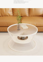 Petite table basse ronde en verre pour salons de maisons compactes, style luxe léger pour hôtels et appartements, table de couleur crème