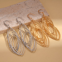 Boucles d'oreilles en fil de fer style européen et américain, en zircon métallique, ovales, ajourées, en forme de croix, pour femme, tendance, uniques, mode de niche