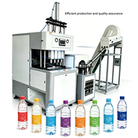 Machine de soufflage semi-automatique à 4 cavités pour bouteilles PET, spécialisée pour les bouteilles d'eau minérale et de jus de 330 ml, 500 ml, 1 L, 1,5 L, 2 L