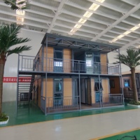 Casa de contenedores de acero y madera de dos pisos, piso desmontable con baño y cocina para hoteles y apartamentos
