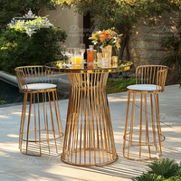 Table de bar ronde de luxe contemporaine en acier inoxydable avec plateau en verre et accoudoirs pour hôtel ou mariage, bar à cocktails haut de gamme