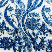 Tissu en maille brodé de sequins pour robe de mariée