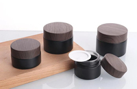 Pot cosmétique vide rechargeable en verre noir givré avec logo personnalisé Conteneur d'ombre à paupières crème pour le visage avec bouchon en grain de bois