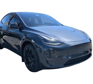 Tesla Model Y 2024 d'occasion, Propulsion intégrale, Longue autonomie, Sièges en cuir foncé, Régulateur de vitesse adaptatif, Conduite à gauche, Toit ouvrant panoramique, Automatique, Prêt pour usage commercial (avec frais d'accident) - Product Image 1