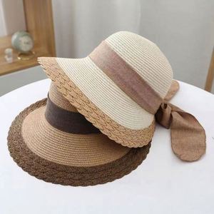 Chapeau de plage à large bord pour femme, style occidental, chapeau de paille pour les vacances en bord de mer, chapeau seau en paille pour femme - Product Image 1