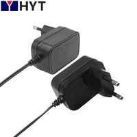 Adaptor Daya Dinding HYT AC DC 12V 1A 1.5A 24V 1A Bersertifikasi ETL RCM untuk Lampu LED