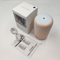 Vente chaude 300ml Mini Atomiseur De Chambre Intelligent À Ultrasons Maison & Hôtel H2O Humidificateur D'air Coloré LED Lumière Portable USB Alimenté