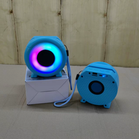 Nouvelle Enceinte Portable Extérieure Mini Sans Fil Étanche en Plastique avec Subwoofer DC, Lumière LED RGB 7 Couleurs et Horloge, Mode Privé Transfrontalier