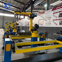 Station de travail robotisée de soudage à double position industrielle, cellule de soudage robotisée pour la soudure de pièces automobiles, de matériel et de métaux