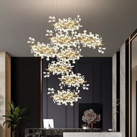 Lustre moderne en céramique en forme de feuille de Ginkgo, long et personnalisé, pour la décoration de hall d'hôtel, de villa ou d'escalier