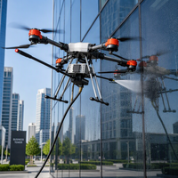Drone de nettoyage de vitres commercial 12MPa haute pression, 60 min d'autonomie de vol, auto-amorçant pour le lavage des façades vitrées en hauteur, IP55