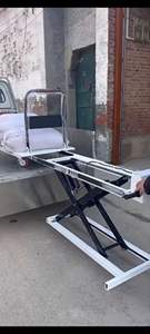 รถเข็นไฮดรอลิกมอเตอร์ไฟฟ้าสำหรับงานหนัก  แท่นยกแบบกรรไกรสแตนเลส  รถเข็นยกแบบกรรไกรสำหรับนาฬิกาโมอิสซาไนต์ รับน้ำหนักได้ 100 กก. - Product Image 6