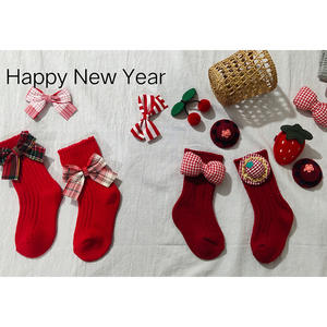 <span class=keywords><strong>Bas</strong></span> décontracté tricoté en <span class=keywords><strong>laine</strong></span> épaissie pour bébés à tube moyen pour enfants Design de Noël espagnol rouge avec nœud en coton doublé polaire hiver - Product Image 2