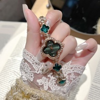 AIMANA Montre à quartz pour femme haut de gamme, étanche, incrustée de cristaux et de diamants, motif trèfle à quatre feuilles, 26 mm, aiguille, virale sur TikTok