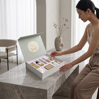Boîte cadeau rigide de luxe personnalisée avec insert de séparation de précision pour l'emballage d'ensembles d'articles de toilette et de cosmétiques d'hôtel