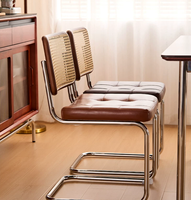 Chaise de salle à manger moderne en métal avec aspect rotin, imperméable et écologique, pour l'extérieur et l'intérieur