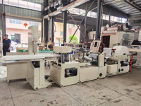 Machine de fabrication de papier bavoir dentaire jetable