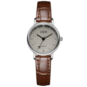Reloj de alta gama para mujer con textura de tela delicada, esfera de cuarzo, reloj moderno. - Product Image 1