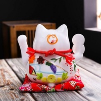 Mignon chat porte-bonheur en céramique blanche délicate et populaire Maneki Neko avec main ondulée pour la décoration intérieure de la boutique