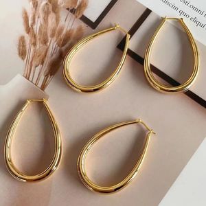 Xinfly Latest Fashion Hypoallergenic AU750 18K Pure Gold Teardrop Oval Chunky <b>Large</b> Lady Big <b>Hoop</b> Earrings for Woman - Product Image 4