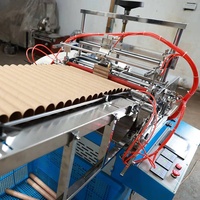 Machine d'étiquetage automatique de noyaux de papier PLC avec système de colle thermofusible, vitesse de 10 à 40 fois/minute, chargement/déchargement automatique