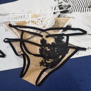 Culottes sexy européennes et américaines pour femmes, à fleurs, solubles dans l'eau, transparentes, lingerie séduisante. - Product Image 3