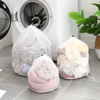 Sac à linge en filet de nylon réutilisable à cordon de serrage, sac de lavage domestique en maille grossière pour vêtements, vente en gros à prix réduit