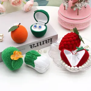 Hermosos joyeros pequeños de terciopelo con diseño de fruta flocada personalizados, embalaje de joyería pequeño elegante vendido en fábrica