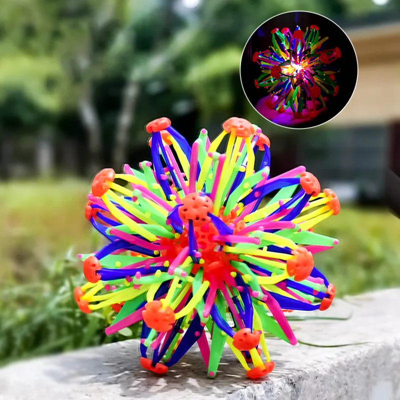बच्चों को इंद्रधनुष रंगों का विस्तार करने वाली सांस लेने वाली गेंद तनाव जादू खिलौना का विस्तार फूलों की गेंद से चमकता हुआ