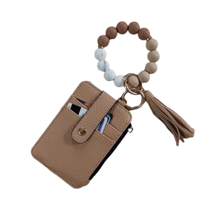 2026 Llavero de piel sintética con cuentas de silicona, tarjetero de identificación y crédito, monedero para mujer con pulsera tipo brazalete - Product Image 1