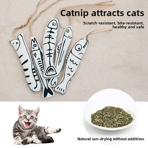 Alta calidad nueva hierba gatera tela de algodón pez juguete autoentretenimiento colgante masticar gato juguete - Product Image 1