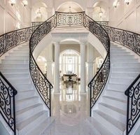 Moderne Indoor White Marble Closed Step gebogene Treppen Schmiedeeisen Metall Wendeltreppen Bogen Treppen