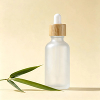 Flacon compte-gouttes en verre givré avec couvercle en bambou, emballage écologique pour soins de la peau, pour sérum et essence