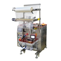 Machine d'emballage automatique à alimentation manuelle YAOMATEC modèle 550 pour le thé, les aliments, les pièces et accessoires, équipée d'une imprimante à jet d'encre.
