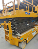 Plateforme élévatrice à ciseaux électrique d'occasion GTJZ1412 en bon état, hauteur de plateforme 14m, capacité 320kg, autopropulsée
