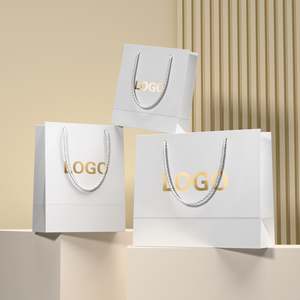 Sacs cadeaux en papier kraft imprimés en gravure classique, vêtements et chaussures de luxe personnalisés, poignées de longueur de main, options de couleur personnalisées, durables - Product Image 1