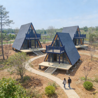 Cabines de camping en bois de style triangle, maisons préfabriquées, maisons modulaires en conteneurs, cabines de luxe pour solutions de projets et usage commercial